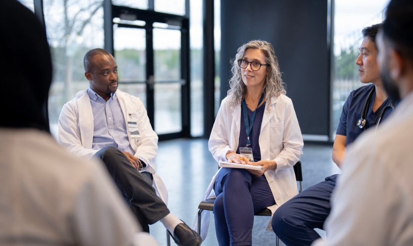 https://www.capc.org/images/JGL0BHAuV91KhJRvXNmt7ZQa2iA%3D/2231/max-2048x1024/A_group_of_clinicians_sitting_in_a_circle_for_a_well-being_debriefing_-_84.png